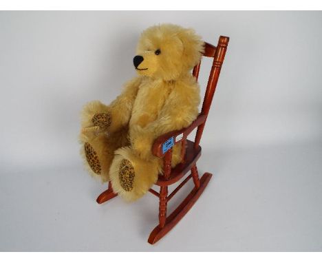 Traditional Treasures - A Traditional Treasures Teddy Bear with leopard foot and hand printed teddy bear with glass eyes and 