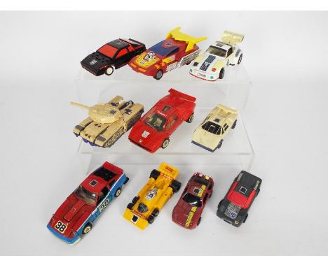Hasbro - Transformers - A collection of 10 x vintage Transformers cars including Runabout, Sideswipe, Smokescreen and others.
