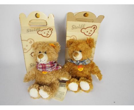 Steiff - two boxed Steiff teddy bears - lot includes two boxed teddy bears with yellow tags in their ears. Both items appear 