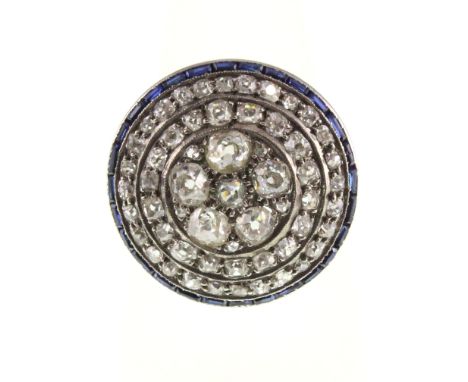 An Art Deco sapphire and diamond cluster ring, the old-cut diamonds approx total weight 1.75ct, the mount stamped 18ct, size 