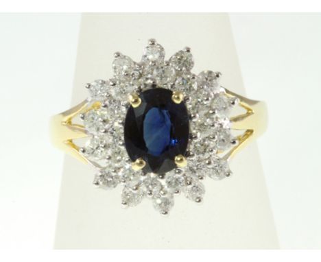 An 18ct H/M sapphire and diamond cluster ring, approx total diamond weight 1.00ct 

CONDITION REPORT - Modern 18ct H/M, overa