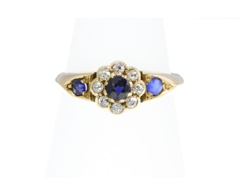 An 18ct H/M sapphire and diamond cluster ring, Chester 1912, size L   [VAT included in hammer price on this lot - this does n