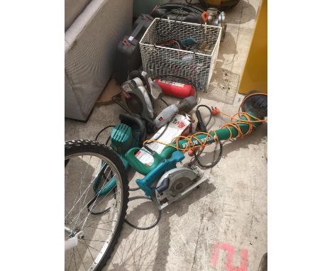 A LARGE COLLECTION OF ELECTRICAL TOOLS TO INCLUDE STRIMMERS, SAWS, DRILLS ETC SOLD AS SEEN 
