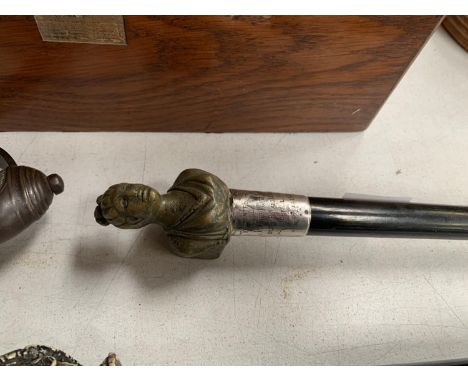 A BRASS HANDLED WALKING STICK WITH HALLMARKED SILVER COLLAR 