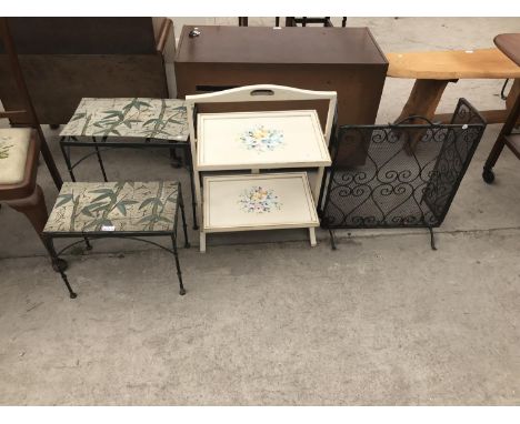 FOUR ITEMS - TWO SMALL METAL TABLES, A FOLDING CAKE STAND AND A BLACK METAL FIREGUARD 