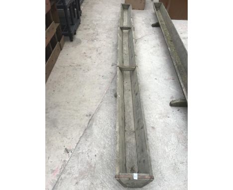 A VINTAGE WOODEN TROUGH 12 FT LONG 