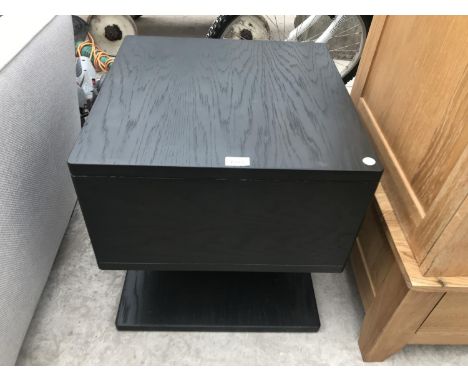 A MODERN BLACK LOUNGE TABLE 