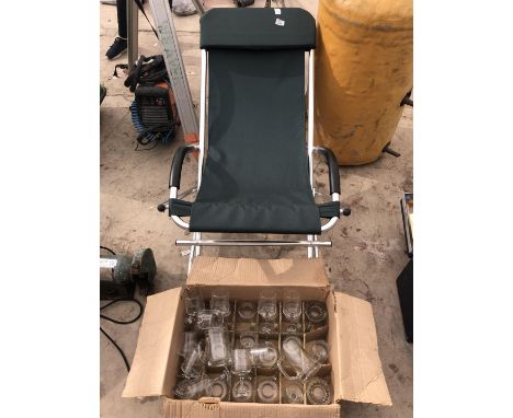 A CANVAS ROCKING GARDEN CHAIR AND VARIOUS GLASSES FOR WINE AND BEER 