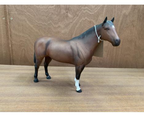 A BESWICK MATT BROWN 'QUARTER HORSE' CERAMIC MODEL 