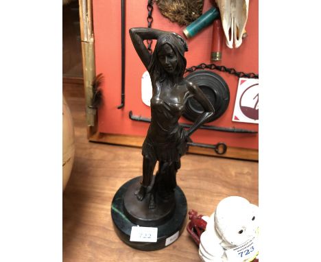 A BRONZE MODEL OF A LADY ON MARBLE BASE 