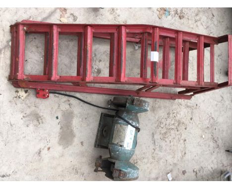 A STEP INDUSTRIAL BENCH GRINDER AND A PAIR OF LARGE CAR RAMPS 