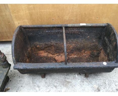 A CAST TROUGH 'DT GRATTON AND SONS LTD BOSTON' 63CM LONG 