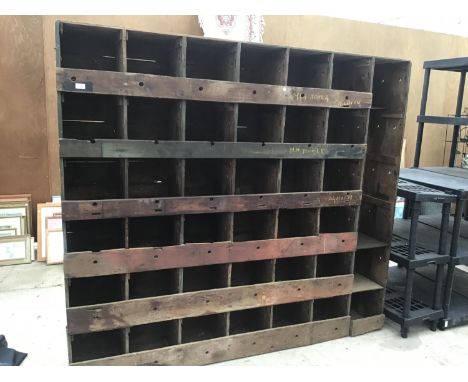 A LARGE VINTAGE PINE PIGEON HOLE CABINET 