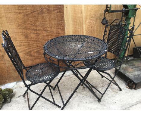 A FOLDING BISTRO TABLE WITH TWO MATCHING CHAIRS 