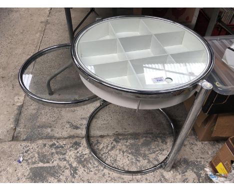 A MODERN COFFEE TABLE WITH NINE SECTION DISPLAY TOP AND PULL OUT GLASS SECTION 