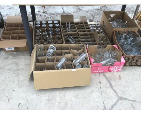 A LARGE COLLECTION OF PUB GLASSES TO INCLUDE ATLANTIC PALE, OTHER BEER GLASSES AND WINE GLASSES (UNDER TABLE) 