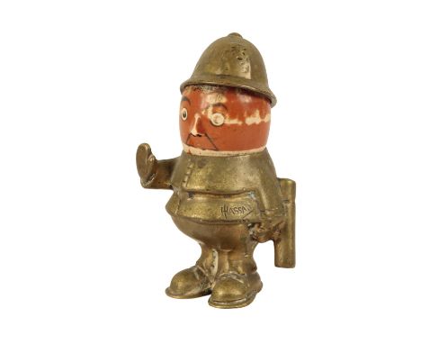 JOHN HASSALL POLICEMAN BRASS CAR MASCOT with ceramic moveable head, signed to the body "Hassall", 13cm high John Hassall, 21s