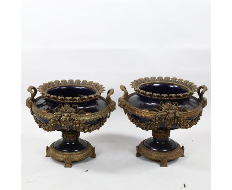Pair of ornate gilt-bronze and blue glazed ceramic urns, with Classical mask handles, height 37cm, width 45cm, reproductionVe