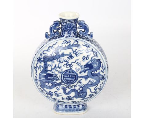 A Chinese blue and white porcelain moon flask, hand painted dragon decoration, 4 character mark, height 18cmPerfect condition