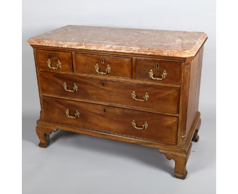 A George III mahogany chest of 2 long and 3 short drawers, with coloured marble top, gilt-bronze drop handles and shaped brac