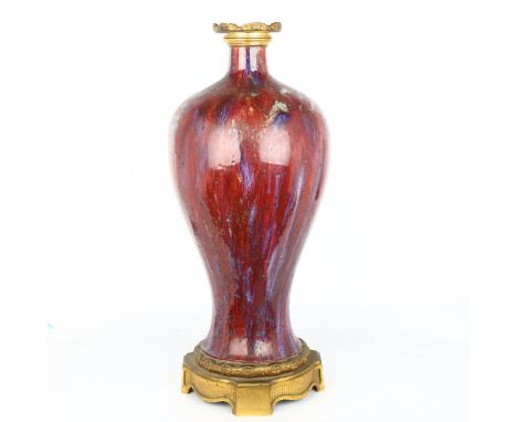 A Chinese sang de boeuf glaze porcelain vase/lamp base, 18th/19th century, with multi-colour blue/red glaze and gilt-bronze c