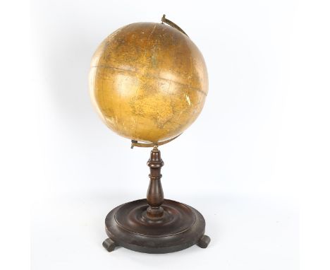 A Philips 12" library globe, on turned wood stand with brass mount, overall height 56cmGlobe is split and slightly warped and