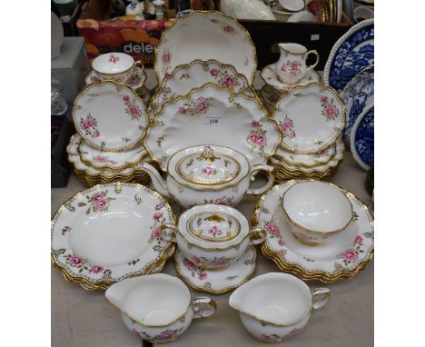 A Royal Crown Derby Royal Pinxton Roses pattern part dinner and tea set, comprising dinner plates, salad plates, side plates,