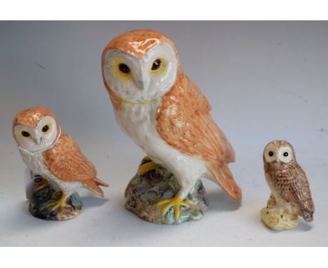 A Beswick ceramic model, Barn Owl, 1046, 18.5cm high; others smaller (3)