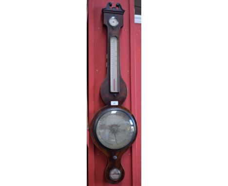 A George III mahogany wheel barometer, 20cm silvered register, alcohol thermometer, hygrometer, the level signed G Votentario