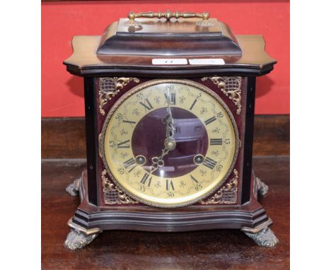 An Odo bracket style mantel clock, brass dial, twin winding holes, Roman and Arabic numerals, striking, key 