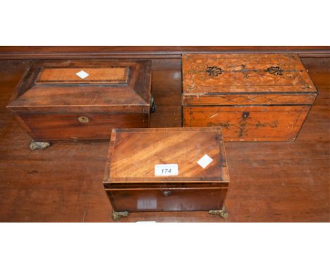 A Regency mahogany rectangular tea caddy, inlaid in ebony with anthemions and scrolls, c.1810; another, George III, c.1800; a