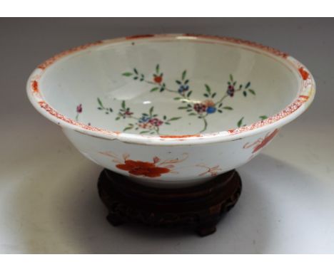 A Chinese porcelain flared circular bowl, the interior painted in colourful polychrome enamels with chrysanthemums, blossom a