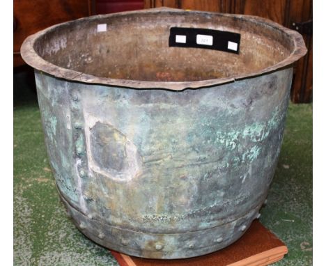 A late 19th century riveted oxidised vessel/planter, 38cm high