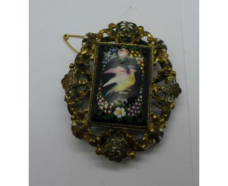 A Victorian gilt metal and enamel brooch