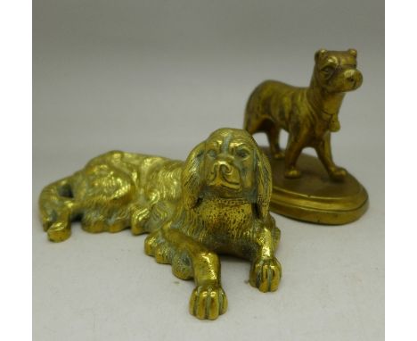 A brass inkwell in the form of a dog and one other brass dog on base