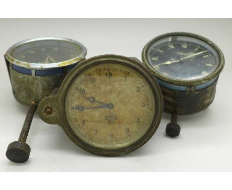A Jaeger car clock and two Smiths car clocks