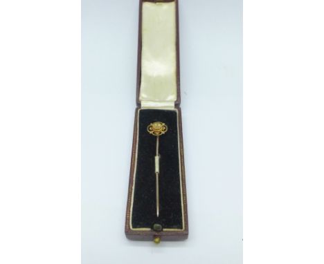 A 15ct gold and diamond stick pin, 1.4g, boxed