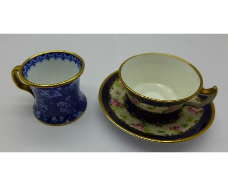 A miniature Royal Crown Derby cup and saucer and a miniature Spode mug