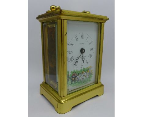 A brass carriage clock, the movement marked Rapport, London, the dial marked Minton