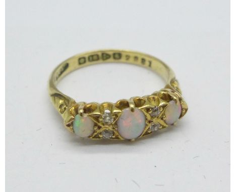 An 18ct gold, opal and diamond ring, Chester 1905, 3.8g, M