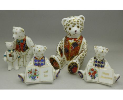 Four Royal Crown Derby Teddy bears, including limited edition Red Tie Teddy bear with gold stopper