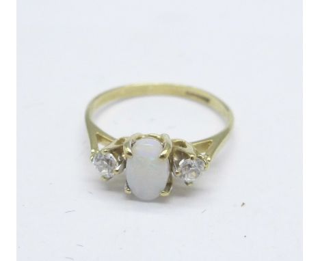 A 9ct gold, opal and clear stone ring, 1.1g, F