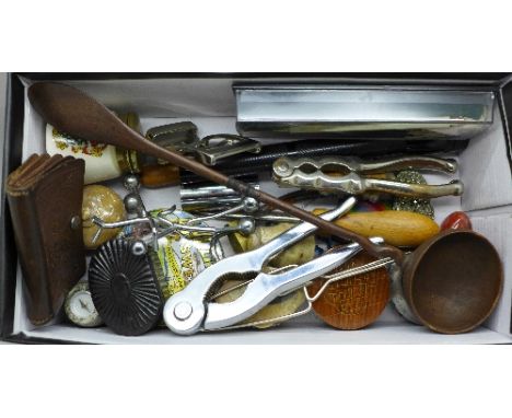 Nutcrackers, a papier mache snuff box, a hardstone set compass, etc.