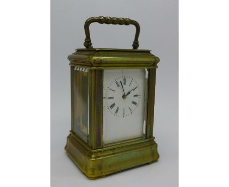 A small brass carriage clock, dial a/f