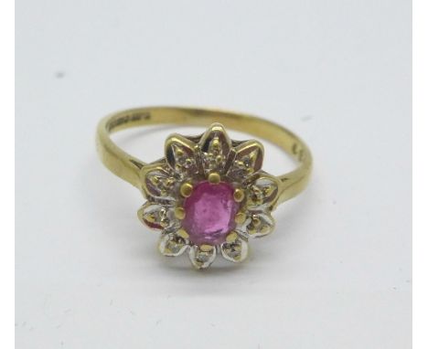 A 9ct gold, ruby and diamond cluster ring, 2.2g, P