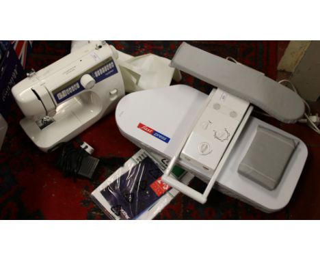 A Brother electrical sewing machine with cover and manual along with a Fast Press electric press.