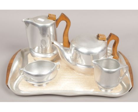 A 1950s vintage picquot ware five piece aluminium tea service.