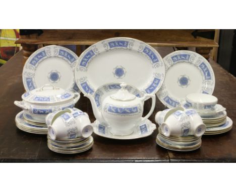 A comprehensive Coalport bone china tea and dinner service decorated in the Revelry pattern including tea pots, cups and sauc
