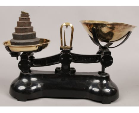 A set of Librasco kitchen scales with brass bowls and weights.