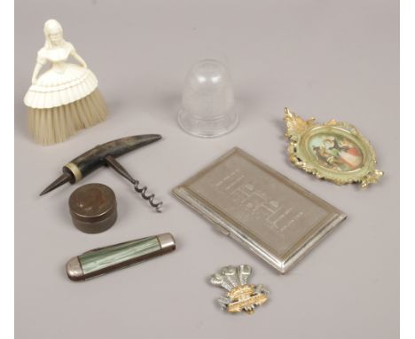 A group of collectables to include cigarette case, corkscrew, folding pocket knife etc.